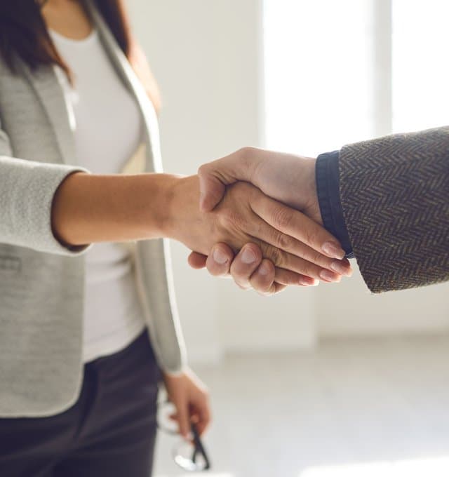 Two people shaking hands