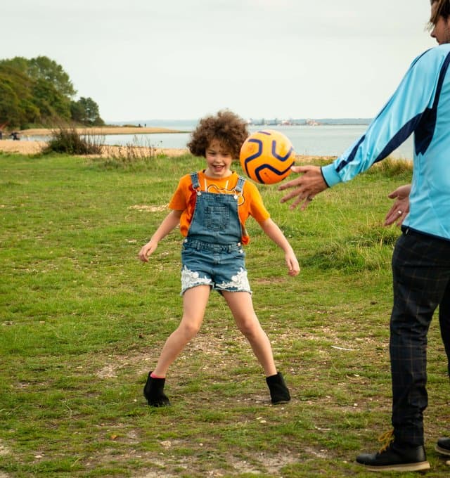 Child playing with ball